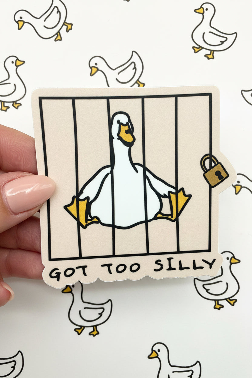 Sticker of a goose in a cage with 'GOT TOO SILLY' text on a checkered background