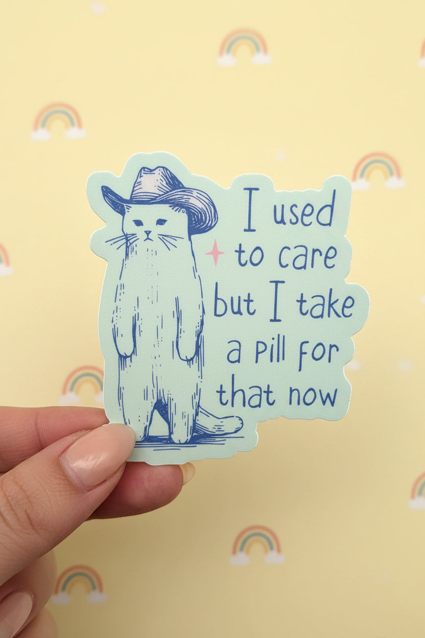 Sticker with a cat wearing a cowboy hat and text on a checkered background