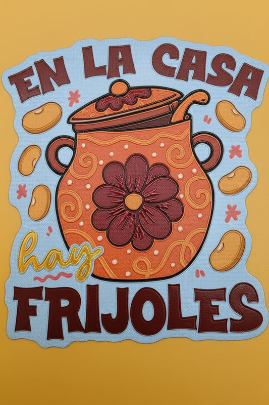 A colorful sticker with the Spanish text 'EN LA CASA hay FRIJOLES' surrounding an orange pot with a dark red flower motif, set against a yellow background.
