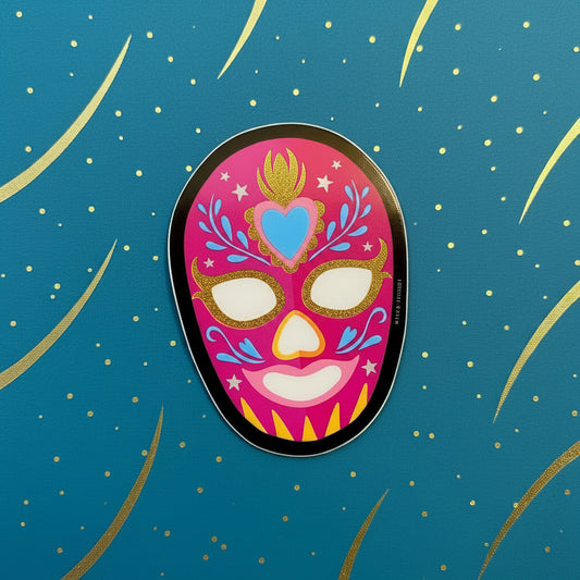 Colorful mask patch on a blue background with gold dots.
