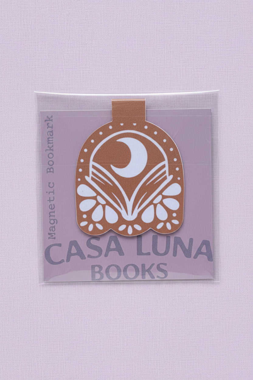 Casa Luna Books magnetic bookmark packaging on a gold background