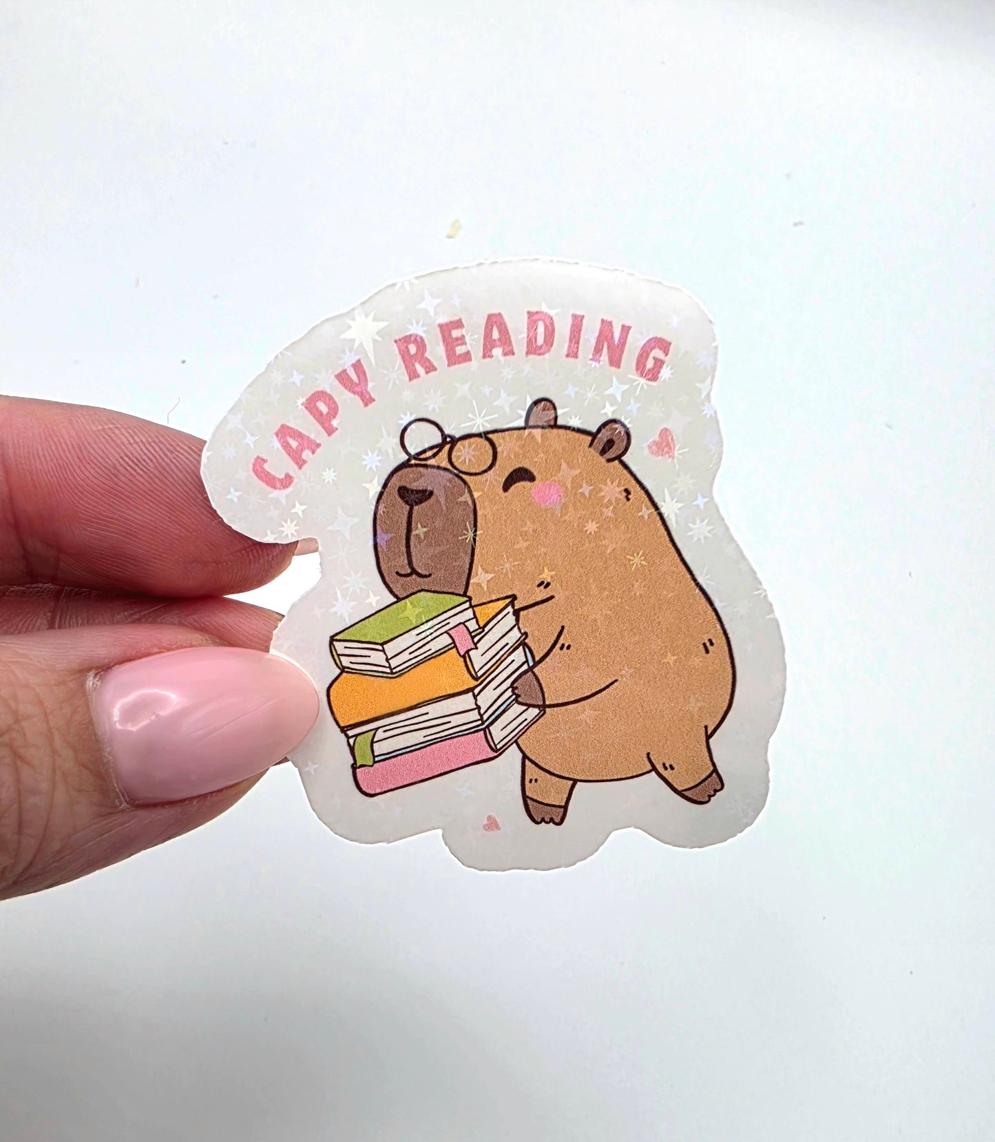 Die Cut Vinyl Holographic Sticker: Capy Reading